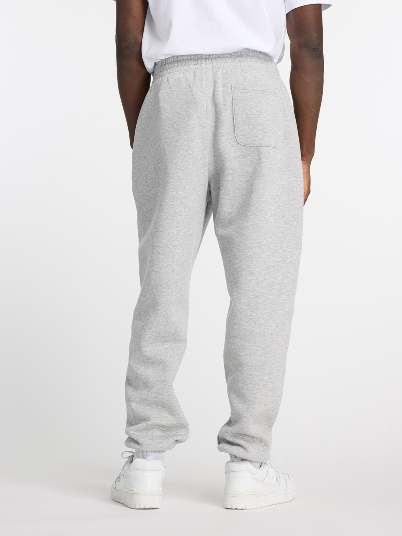 Штани New Balance SPORT ESSENTIALS FLEECE модель MP41503AG Фото