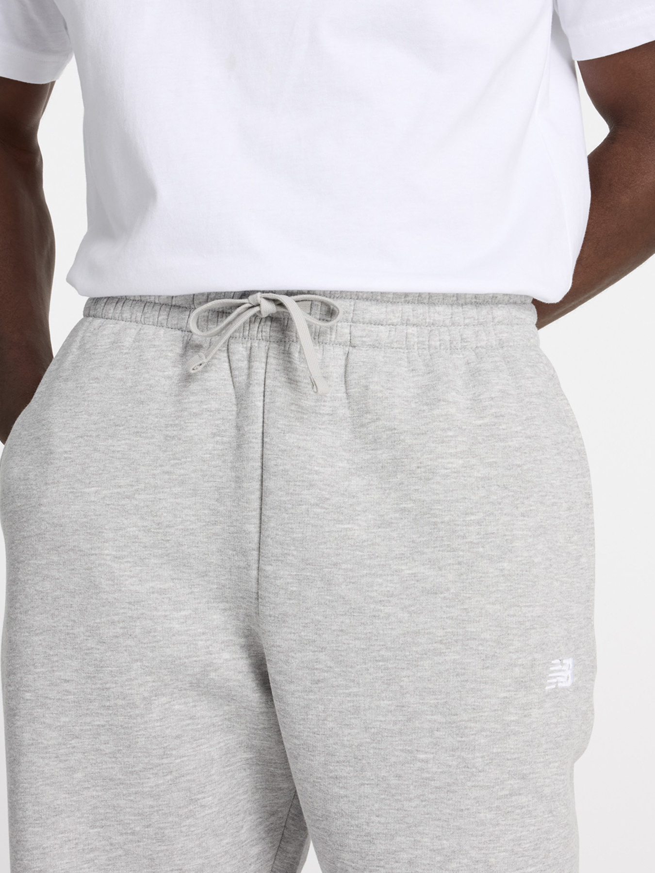Штани New Balance SPORT ESSENTIALS FLEECE модель MP41503AG Фото