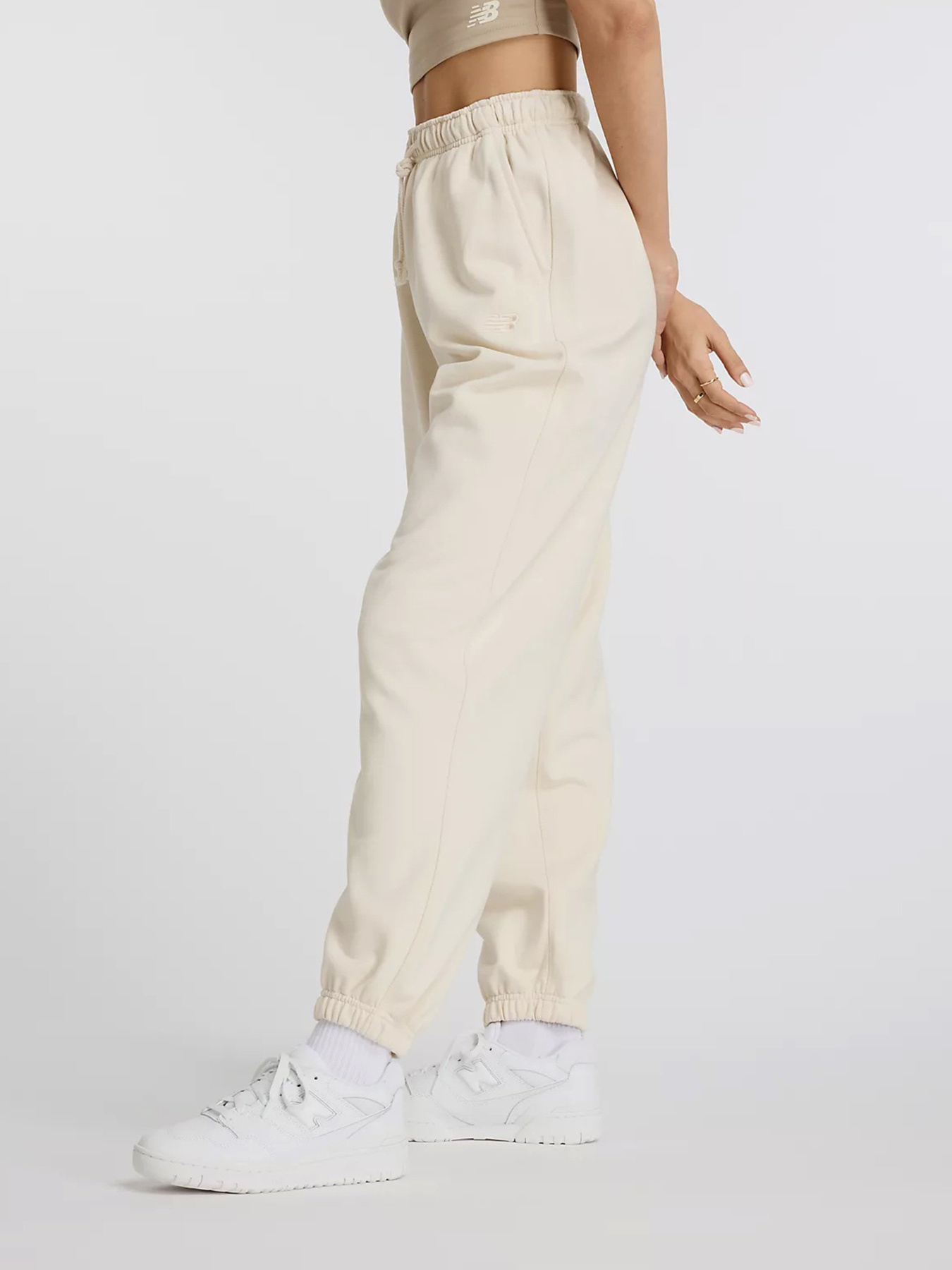 Штани New Balance ATHLETICS модель WP41513LIN Штани New Balance ATHLETICS модель WP41513LIN Фото
