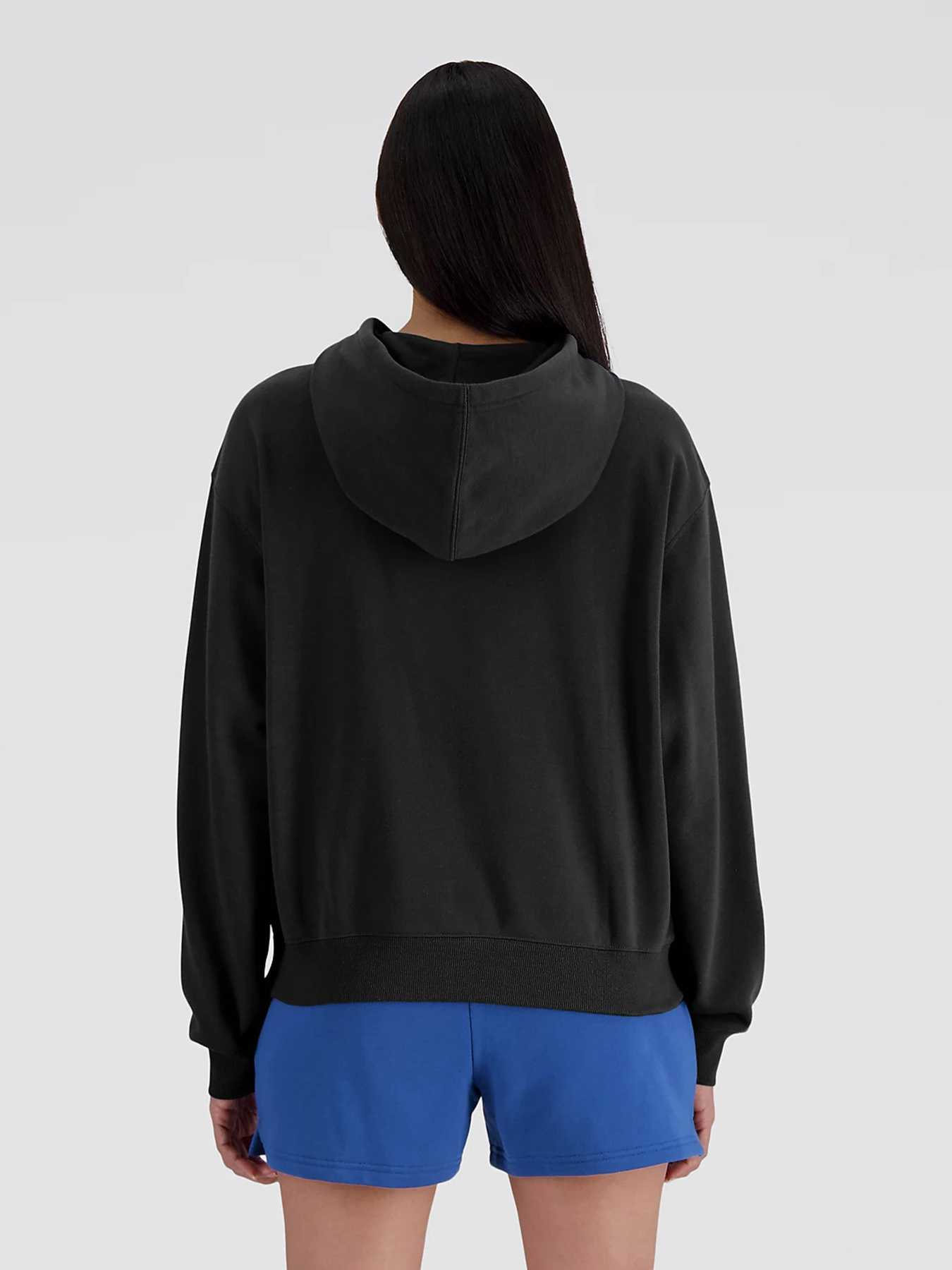 Худі та світшоти New Balance ESSENTIALS FLEECE модель WT41510BK Худі та світшоти New Balance ESSENTIALS FLEECE модель WT41510BK Фото
