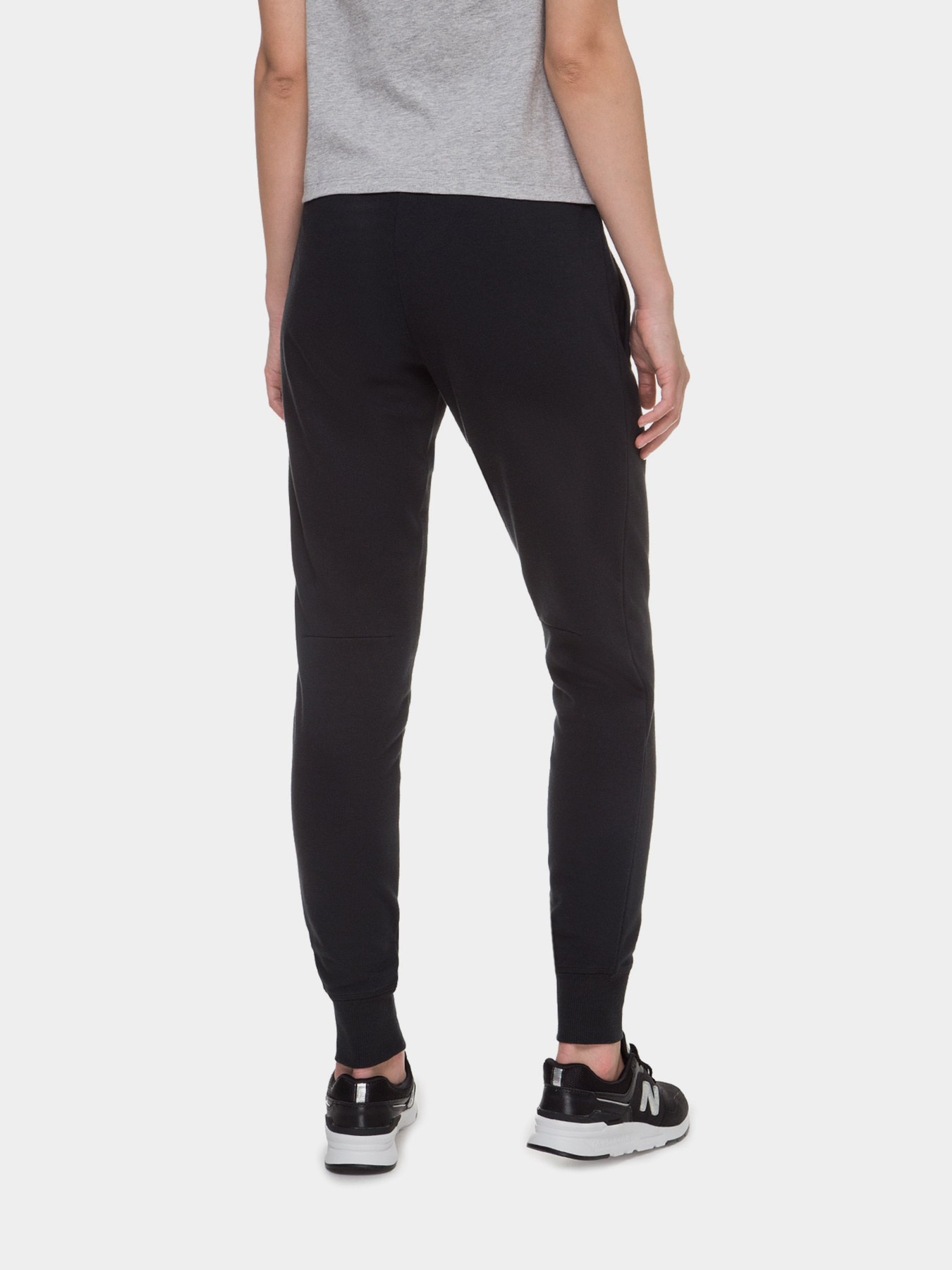 Штани New Balance Essentials модель WP03530BK Штани New Balance Essentials модель WP03530BK Фото