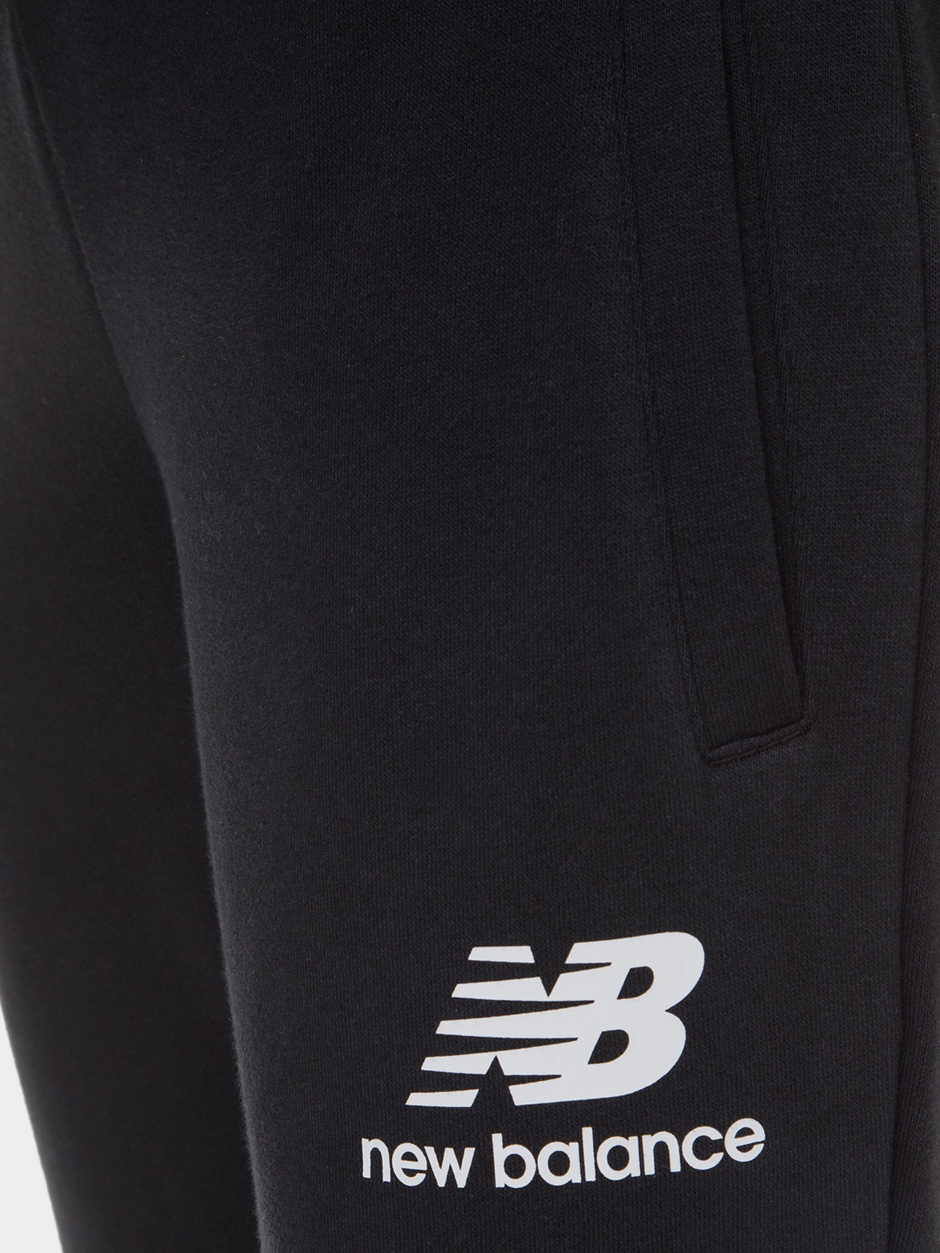Штани New Balance Essentials модель WP03530BK Штани New Balance Essentials модель WP03530BK Фото