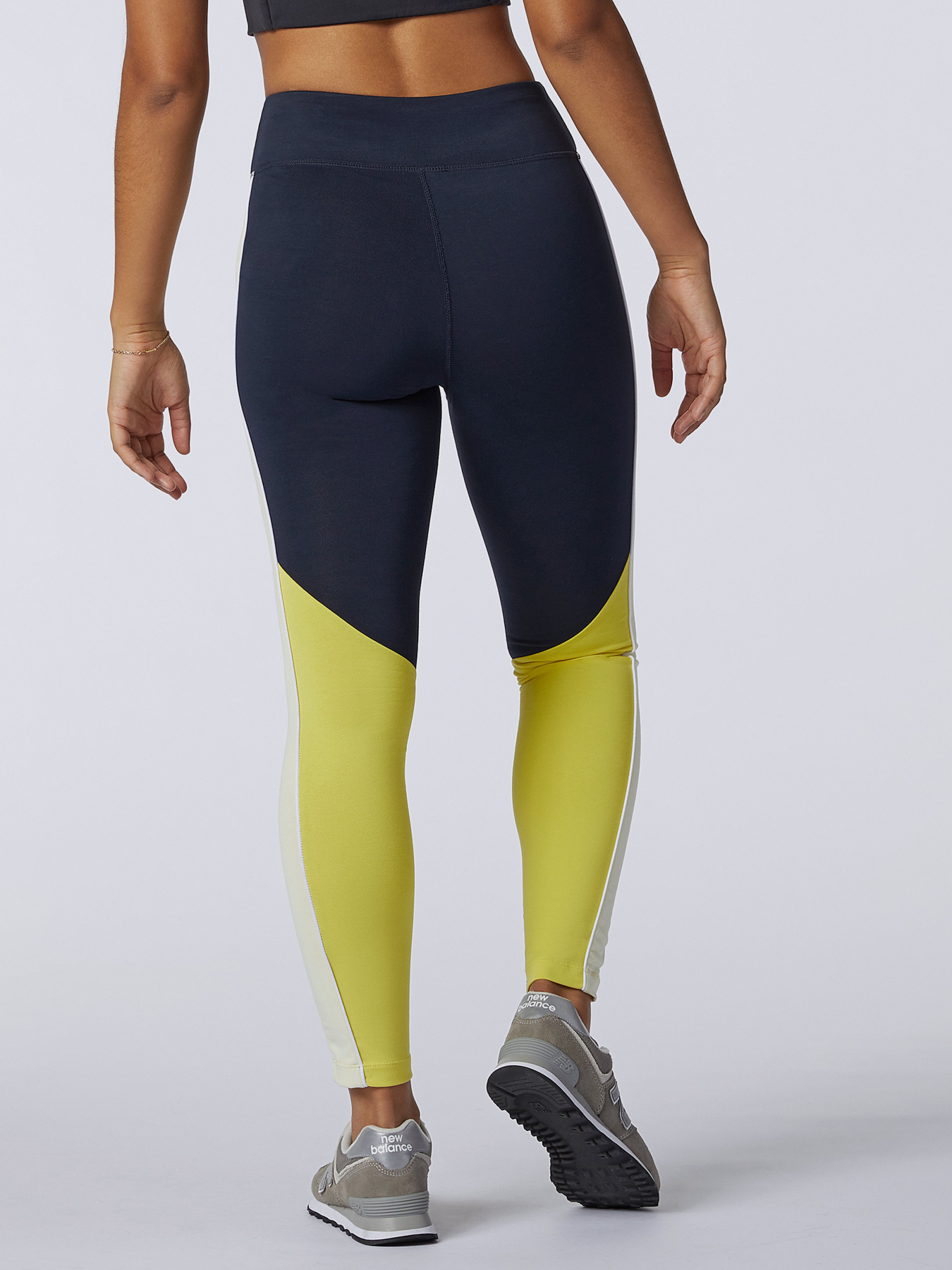Штани New Balance Athletics Piping модель WP11506CYW Штани New Balance Athletics Piping модель WP11506CYW Фото