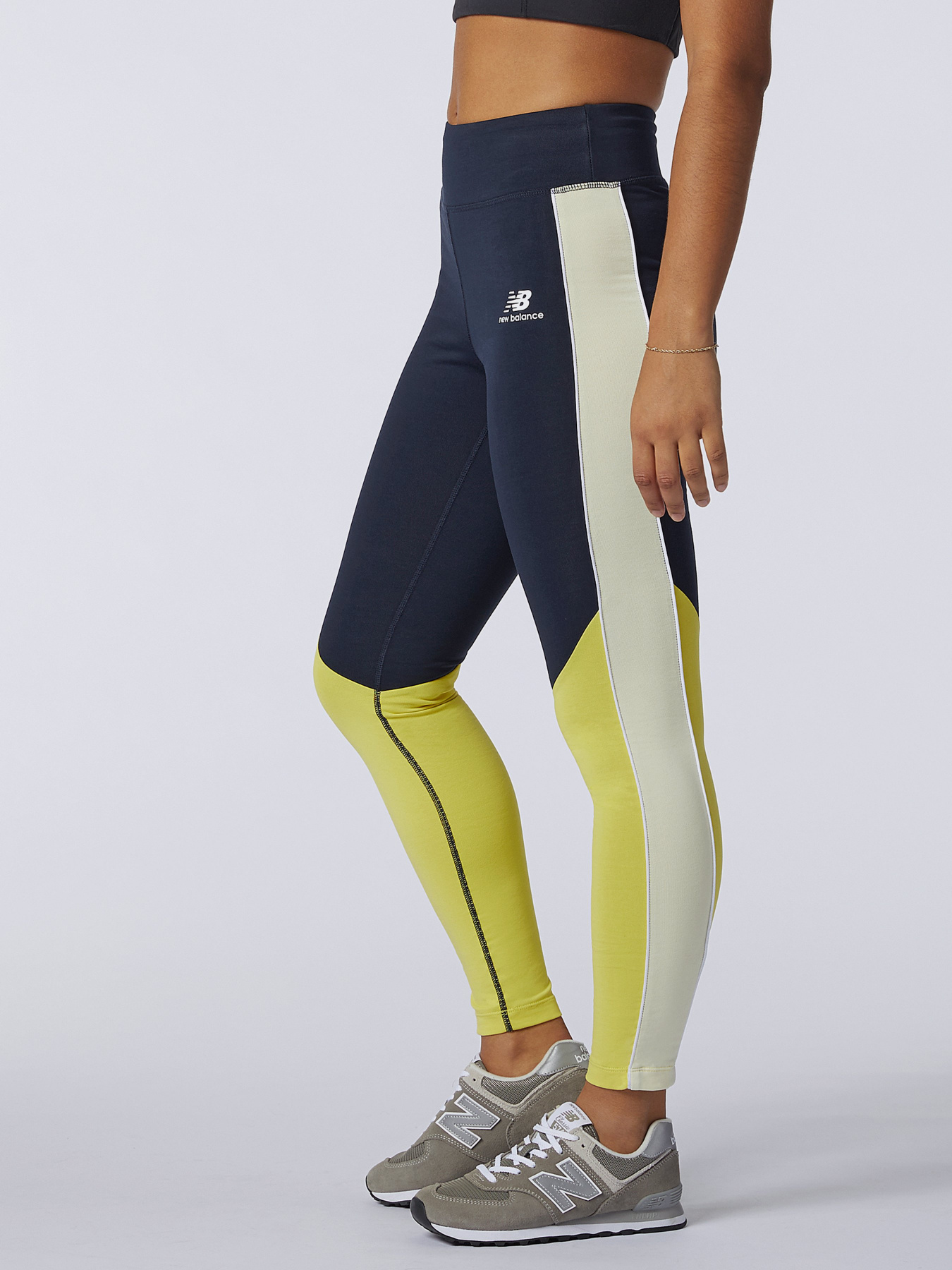Штани New Balance Athletics Piping модель WP11506CYW Штани New Balance Athletics Piping модель WP11506CYW Фото