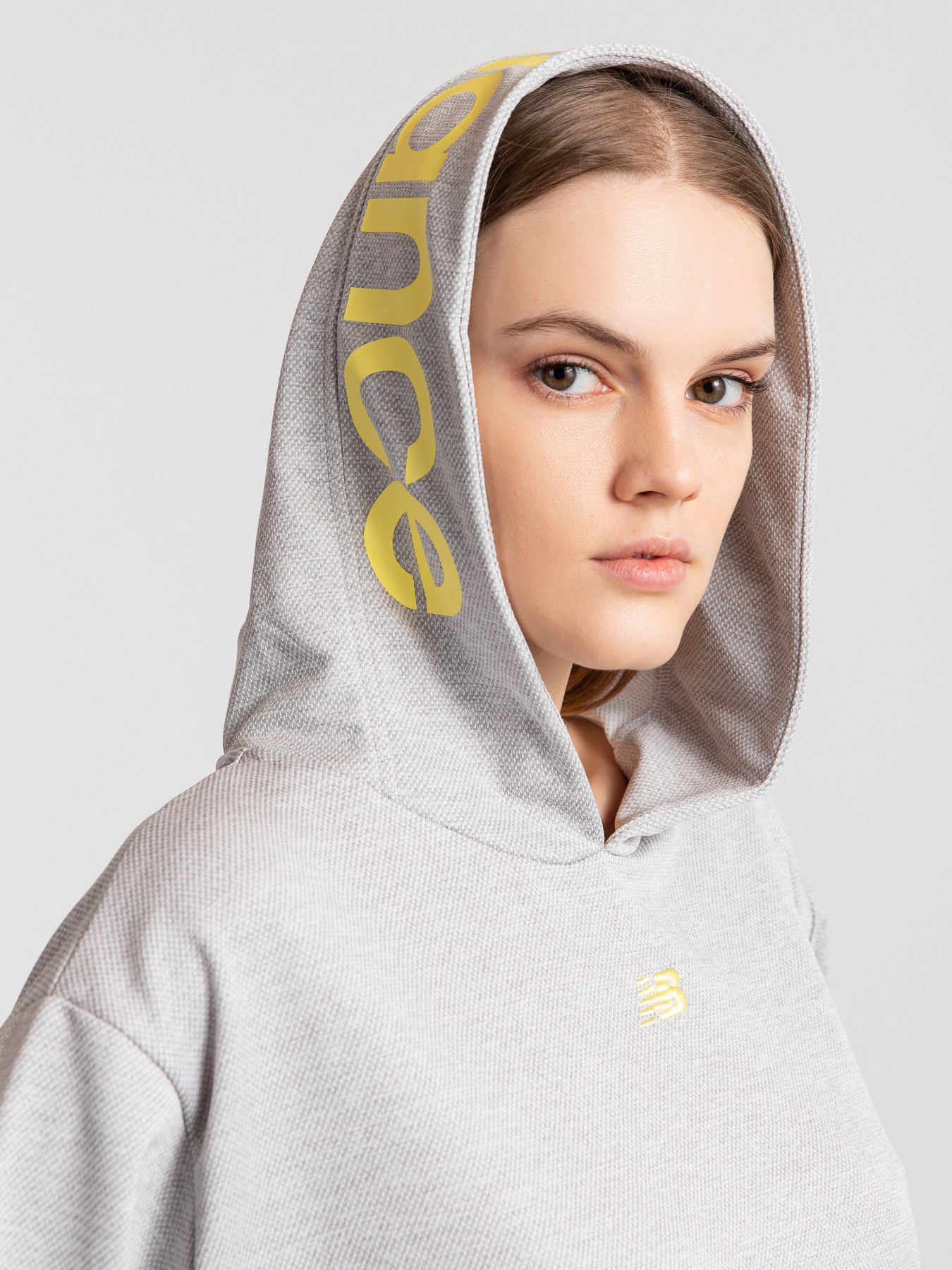 Худі та світшоти New Balance Relentless модель WT11169AG Худі та світшоти New Balance Relentless модель WT11169AG Фото