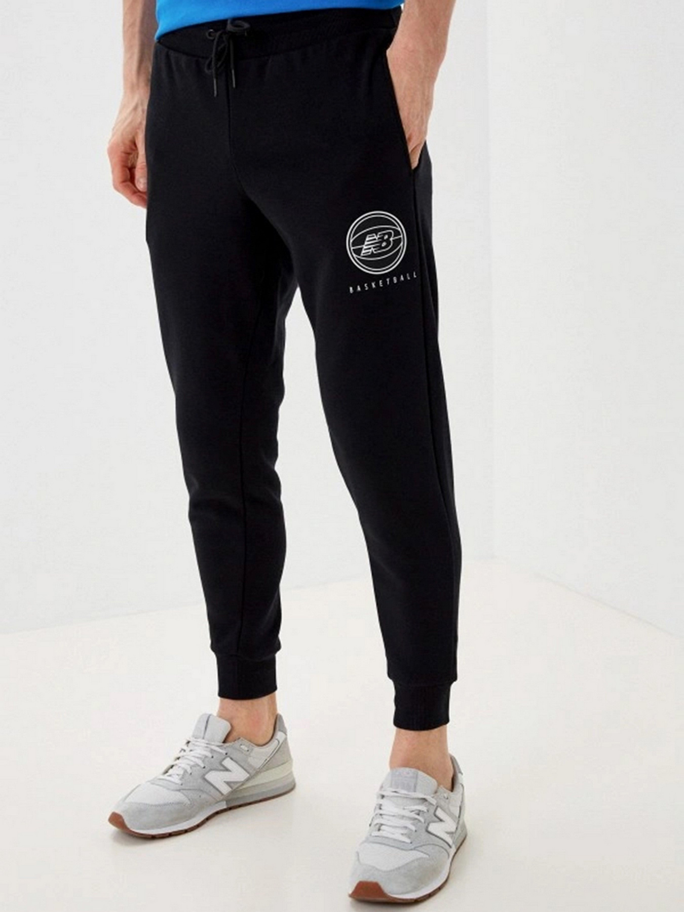 Штани New Balance Hoops Essential модель MP13583BK Штани New Balance Hoops Essential модель MP13583BK Фото