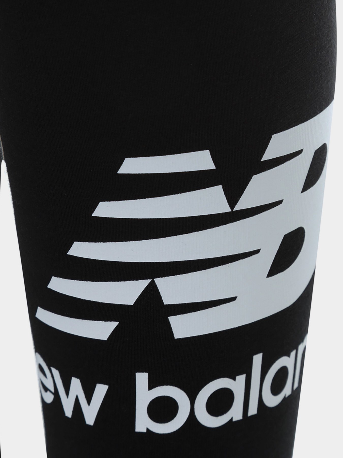 Брюки New Balance Essentials Stacked модель WP21509BK Брюки New Balance Essentials Stacked модель WP21509BK Фото