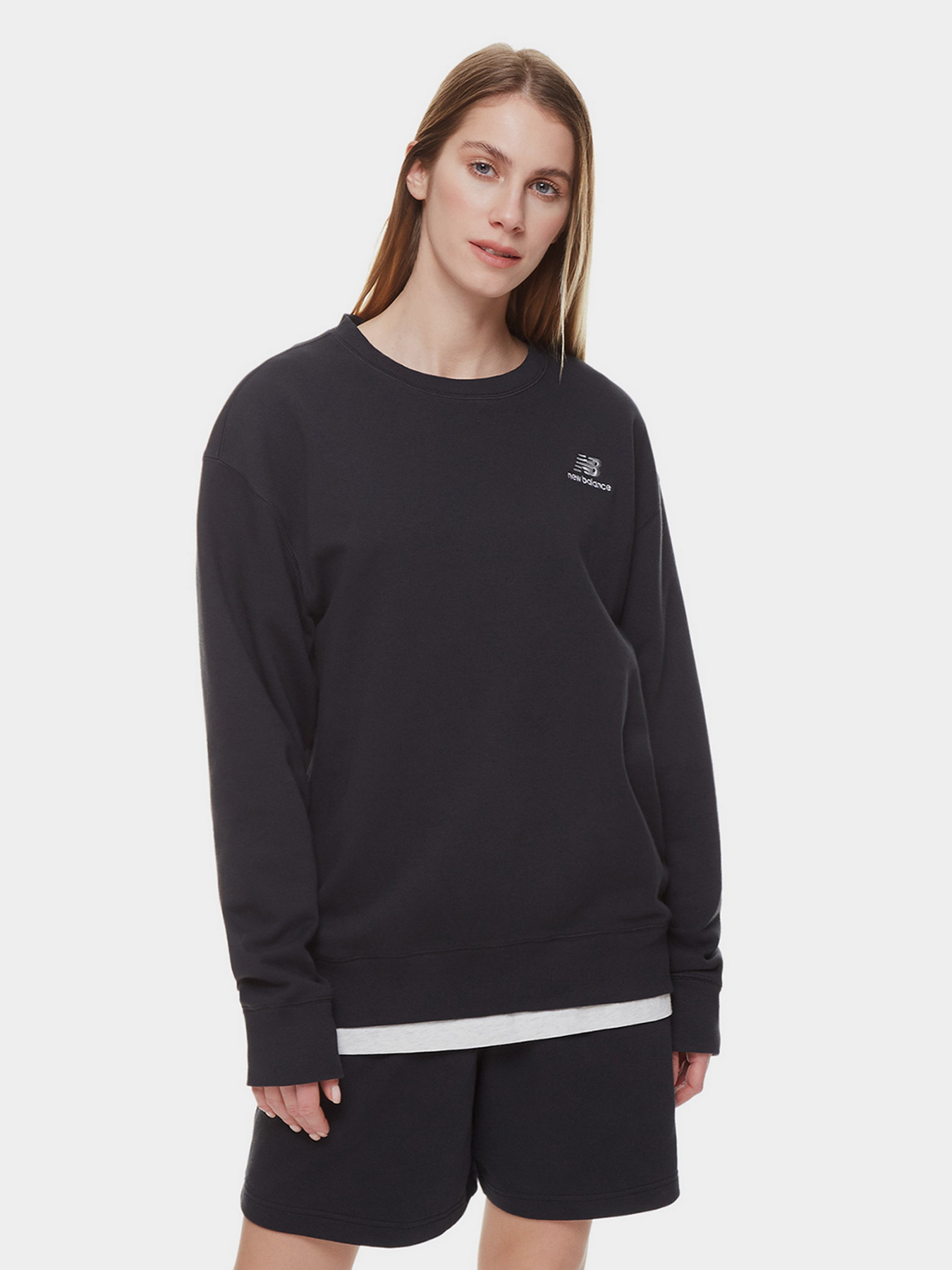 Худі та світшоти New Balance Essentials модель UT21501BK Худі та світшоти New Balance Essentials модель UT21501BK Фото