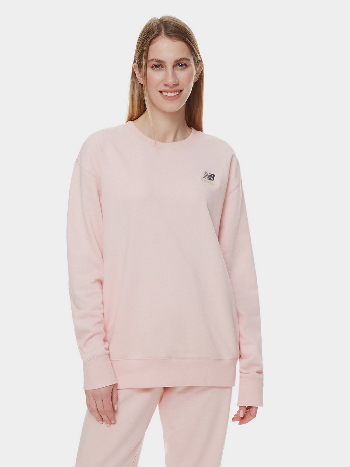 Худі та світшоти New Balance Essentials модель UT21501PIE Худі та світшоти New Balance Essentials модель UT21501PIE Фото