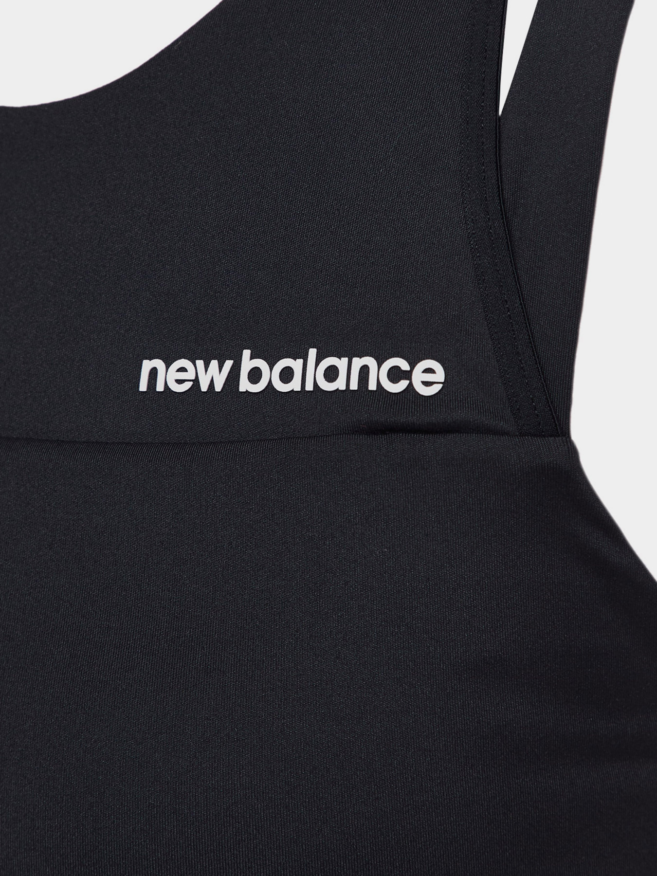 Футболки и поло New Balance Shape Shield модель WB21110BK Футболки и поло New Balance Shape Shield модель WB21110BK Фото