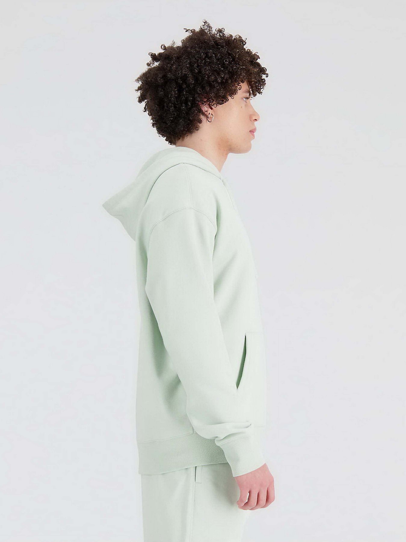 Худі та світшоти New Balance Uni-ssentials модель UT21500SRV Худі та світшоти New Balance Uni-ssentials модель UT21500SRV Фото
