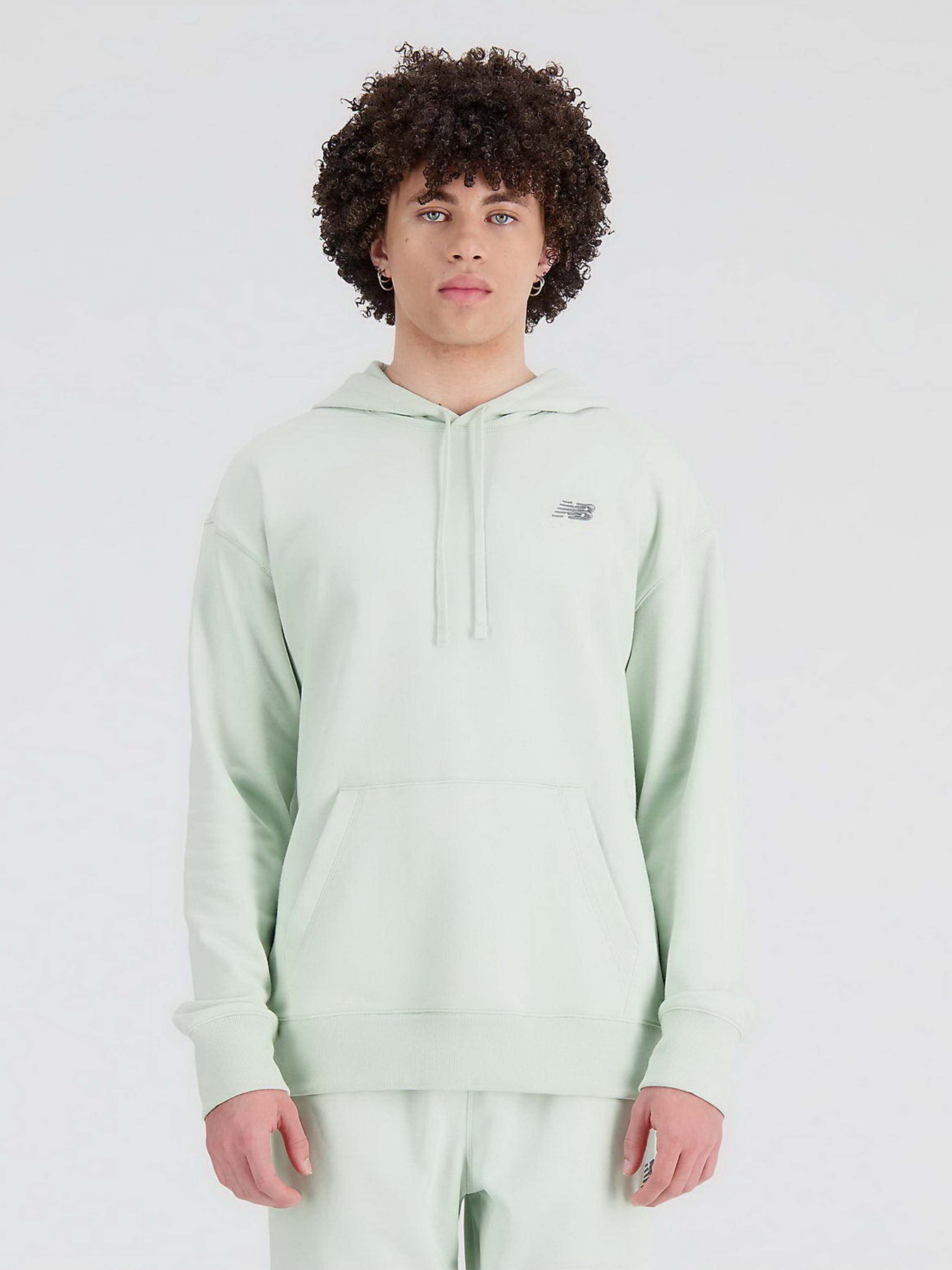 Худі та світшоти New Balance Uni-ssentials модель UT21500SRV Худі та світшоти New Balance Uni-ssentials модель UT21500SRV Фото