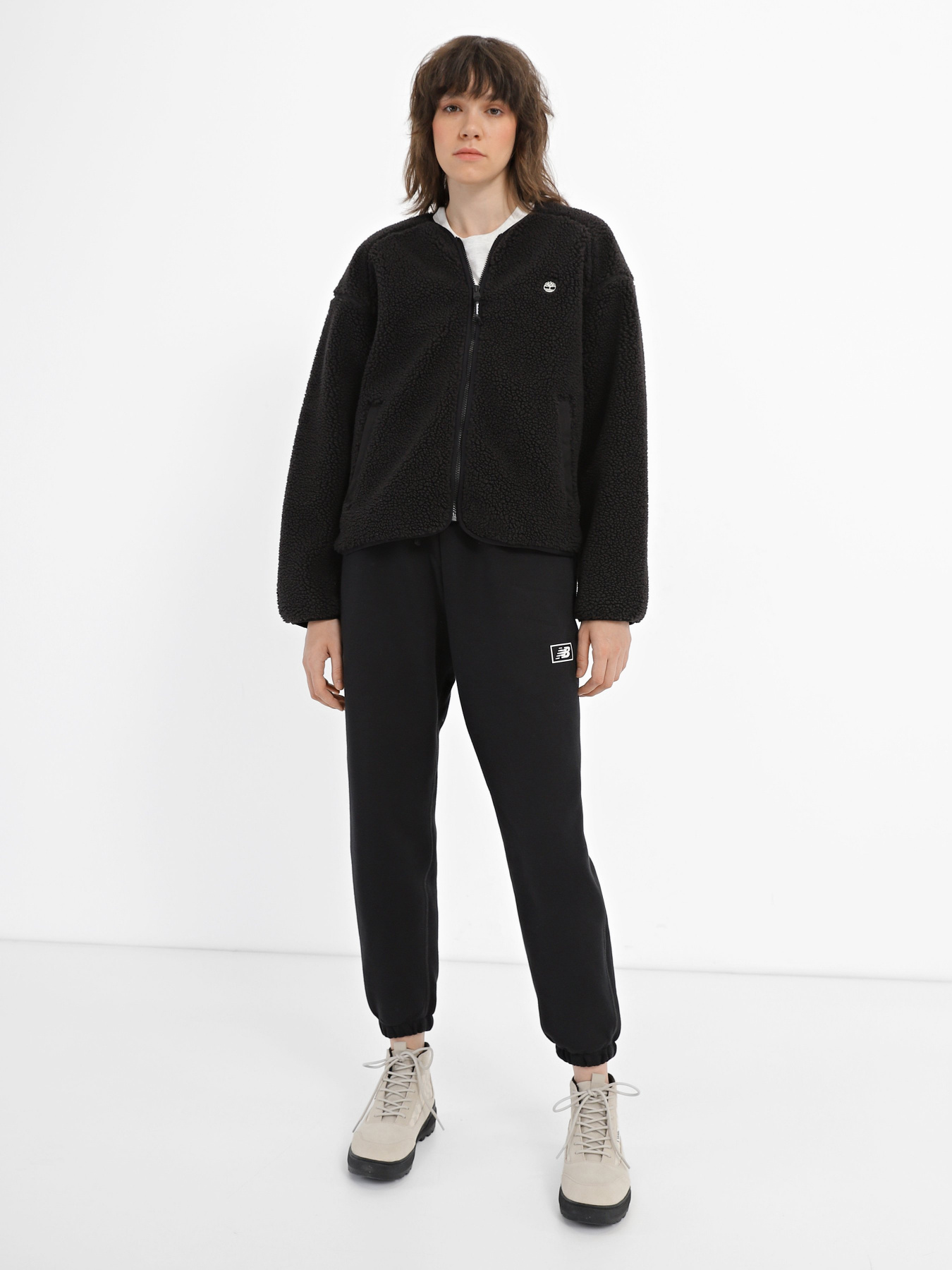 Штани New Balance Essentials Brushed Back Fleece модель WP33500BK Штани New Balance Essentials Brushed Back Fleece модель WP33500BK Фото