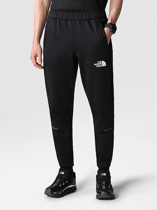 Штани The North Face Mountain Athletics Wind модель NF0A7ZANJK31 Фото