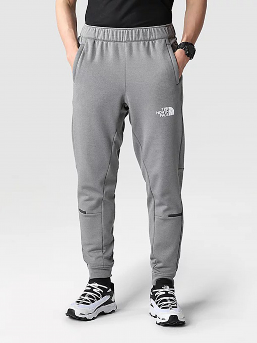 Штани The North Face Mountain Athletics Wind модель NF0A7ZANDYY1 Фото