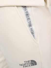 Штани The North Face W Zumu Jogger модель NF0A87DMQLI1 Фото