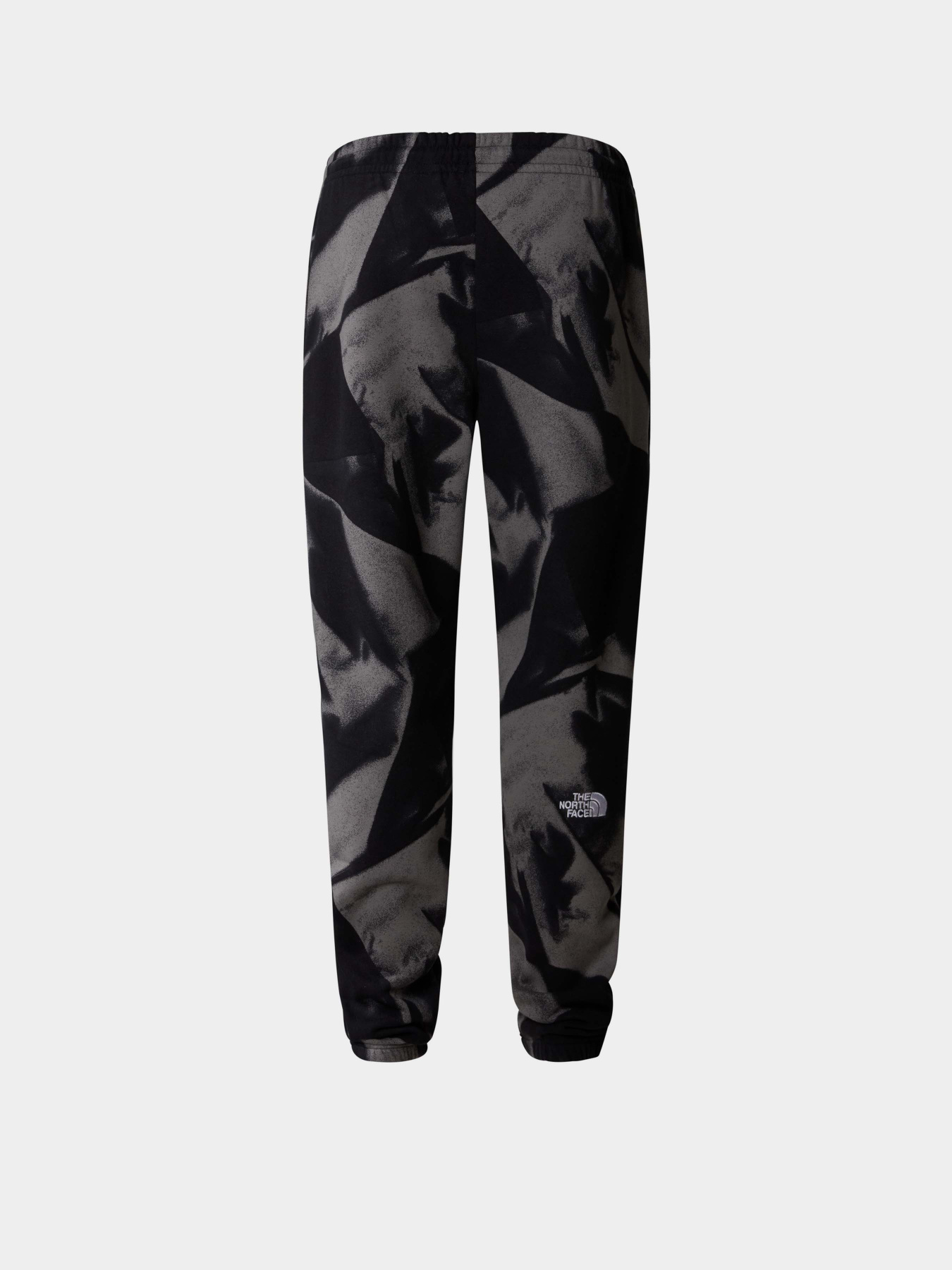 Штани The North Face M Essential Jogger Print модель NF0A881JSIF1 Фото