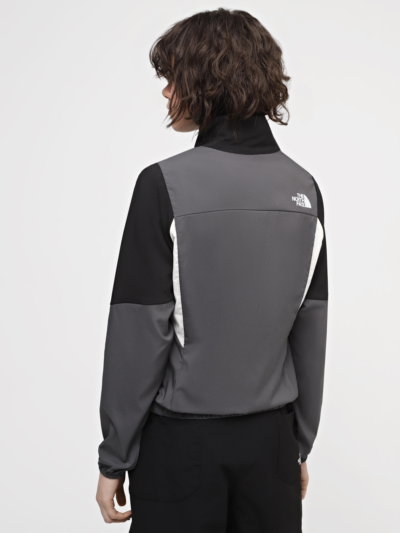 Куртки и дубленки The North Face W Ma Wind Track Top модель NF0A87FM3OD1 Фото
