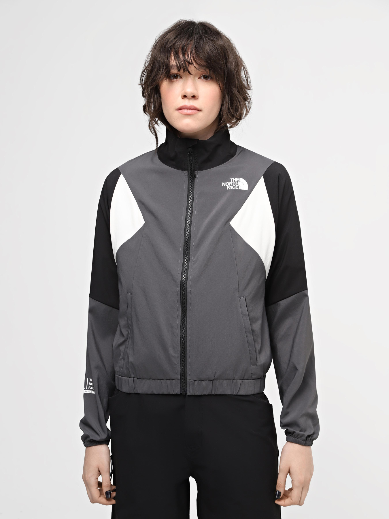 Куртки и дубленки The North Face W Ma Wind Track Top модель NF0A87FM3OD1 Фото
