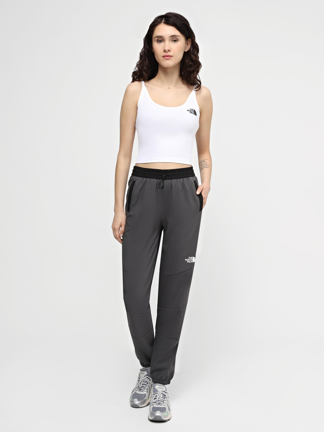 Штани The North Face W Ma Wind Track Pant модель NF0A87G5WUO1 Фото