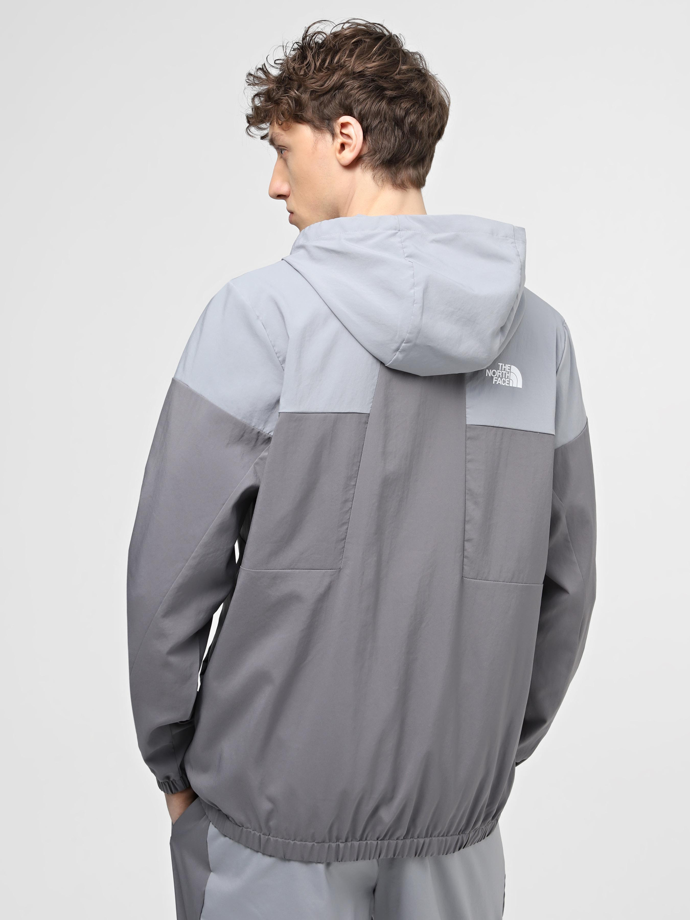 Куртки и дубленки The North Face M Ma Wind Track Hoodie модель NF0A87J2W2O1 Фото