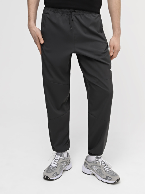 Штани The North Face M Ma Wind Track Pant модель NF0A87J60C51 Фото