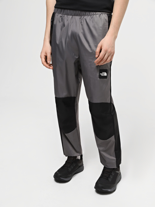 Штани The North Face M Wind Shell Pant модель NF0A879QRPI1 Фото