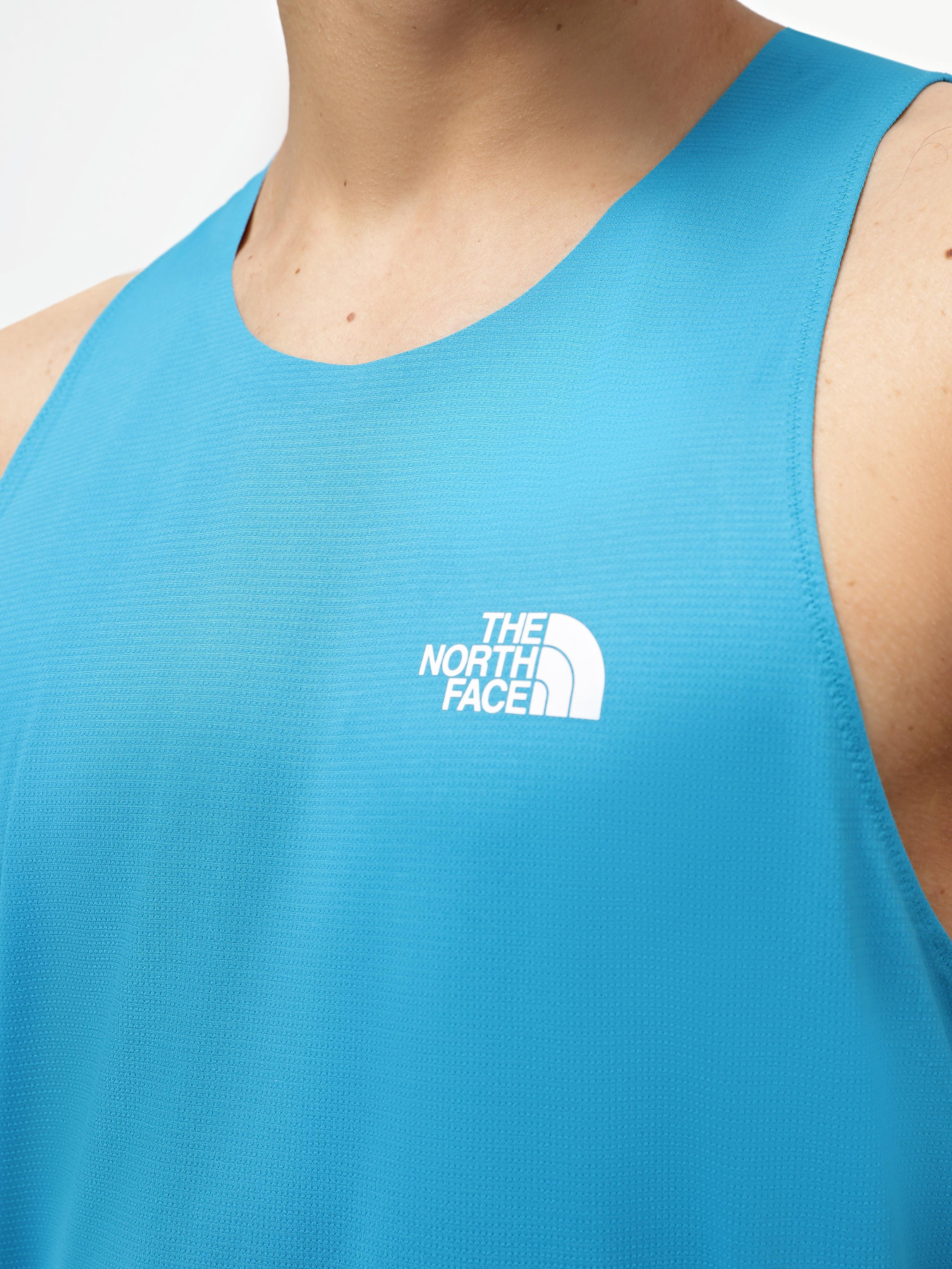 Футболки і поло The North Face Summit Series High Trail Run Tank модель NF0A7ZTSSOL1 Футболки і поло The North Face Summit Series High Trail Run Tank модель NF0A7ZTSSOL1 Фото