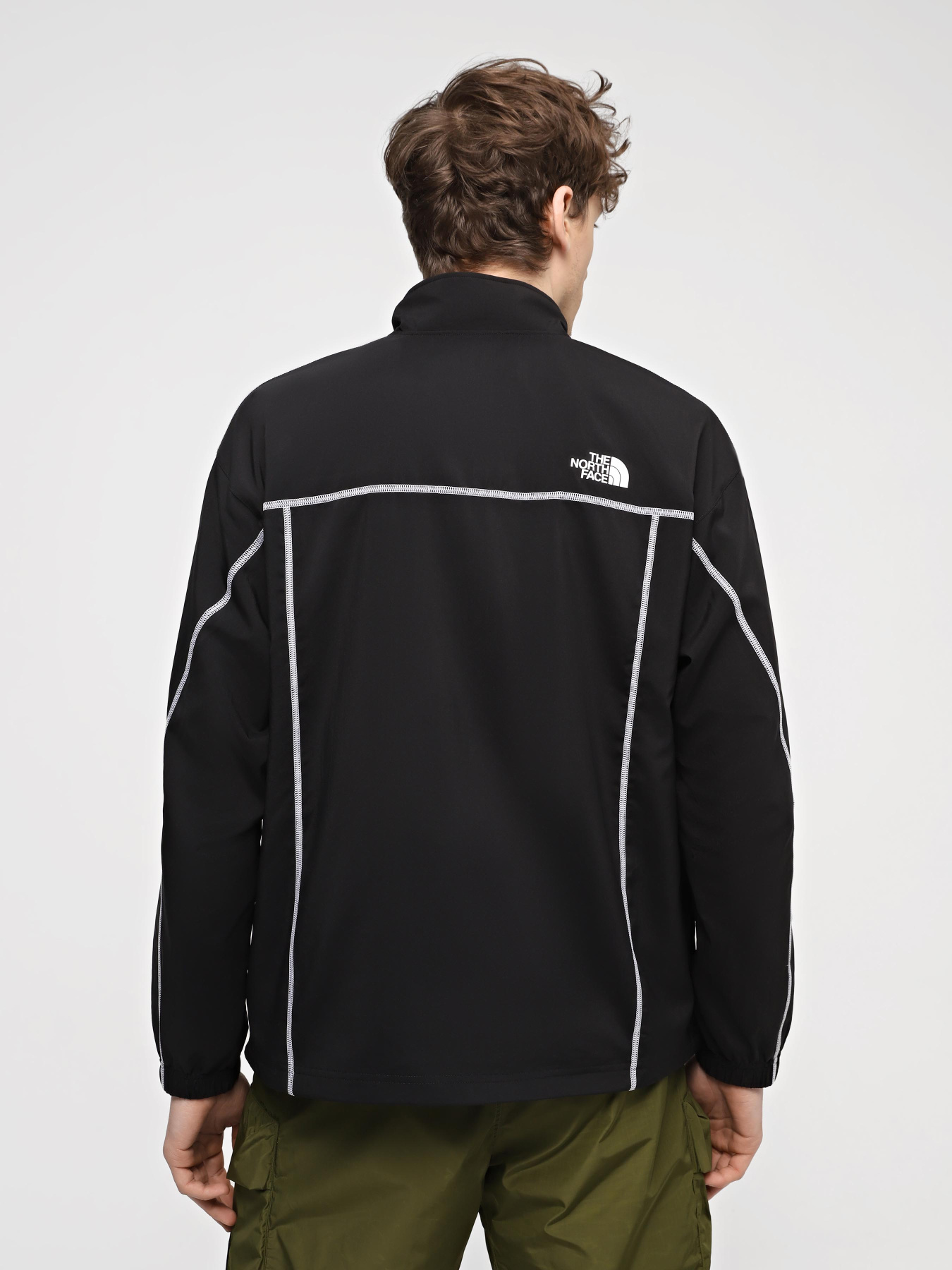 Куртки и дубленки The North Face M Hakuun Wind Jacket модель NF0A883UJK31 Фото
