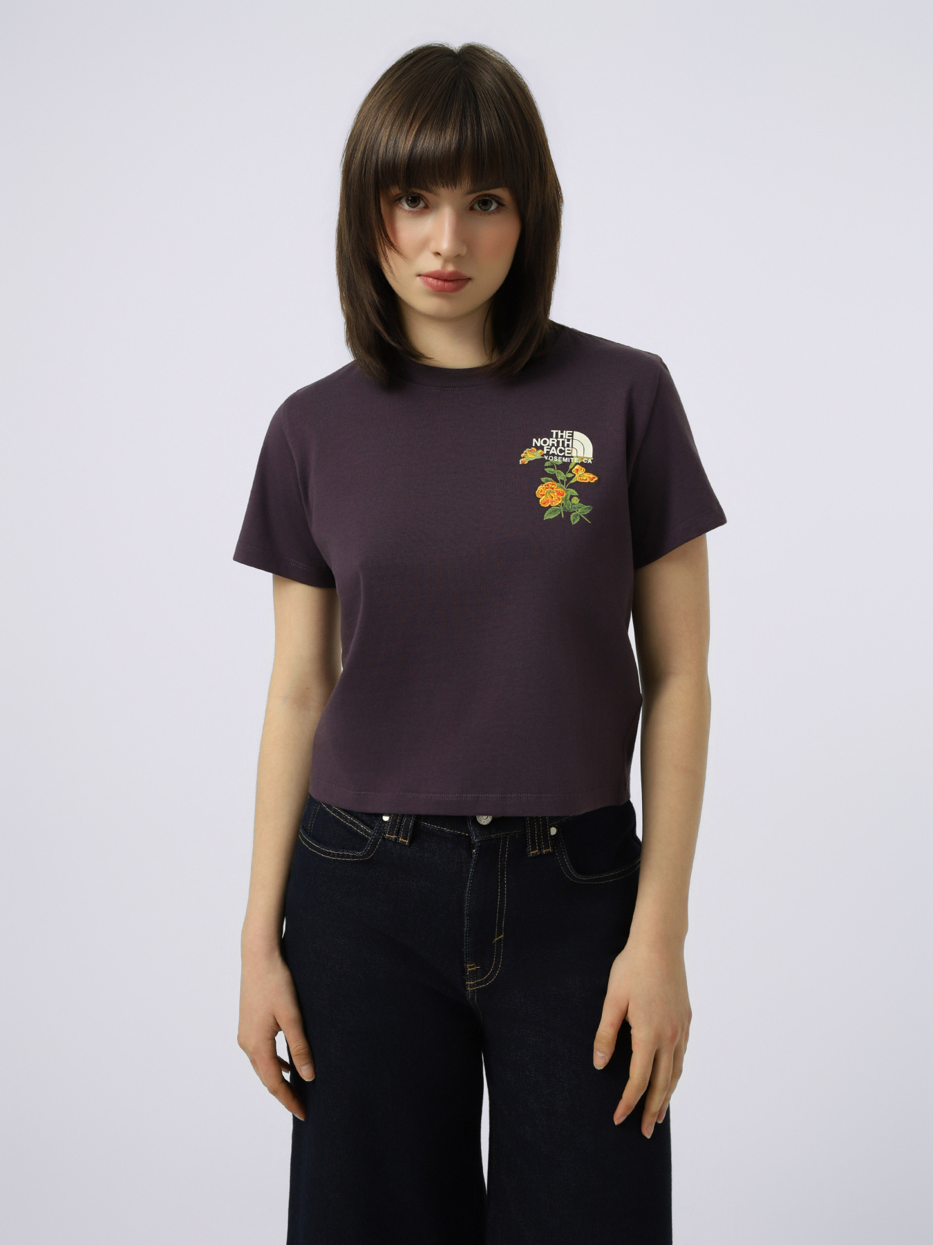 Футболки і поло The North Face W FLORA EMBRO REGULAR SHORT SL модель NF0A8G9QG5O1 Футболки і поло The North Face W FLORA EMBRO REGULAR SHORT SL модель NF0A8G9QG5O1 Фото