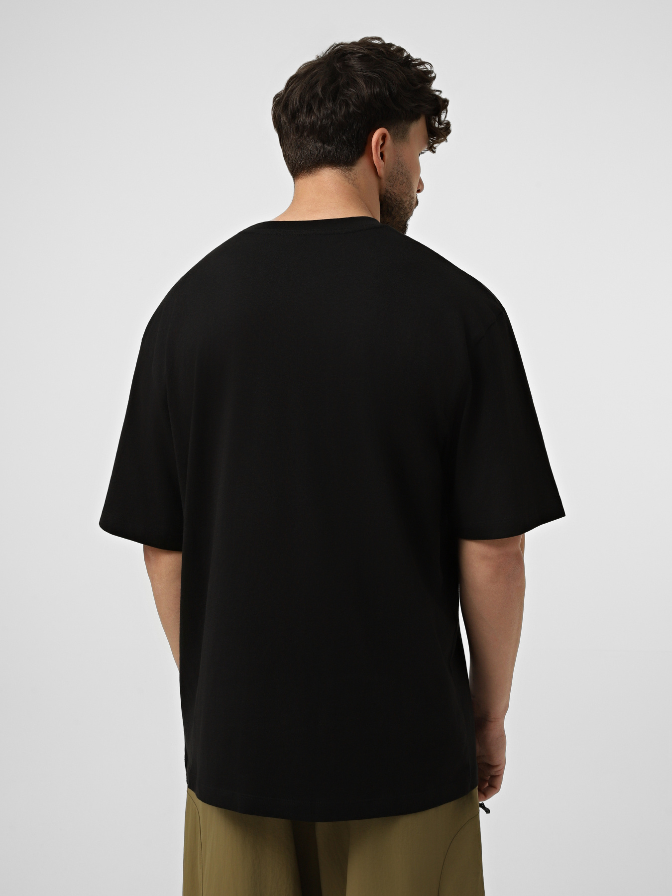 Футболки і поло The North Face M LIQUID LOGO OVERSIZE SHORT S модель NF0A8G9UJK31 Фото