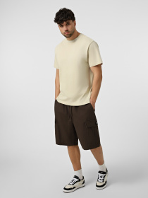 Футболки і поло The North Face M ZUMU RELAXED SHORT SLEEVE TE модель NF0A8GUYDOM1 Фото