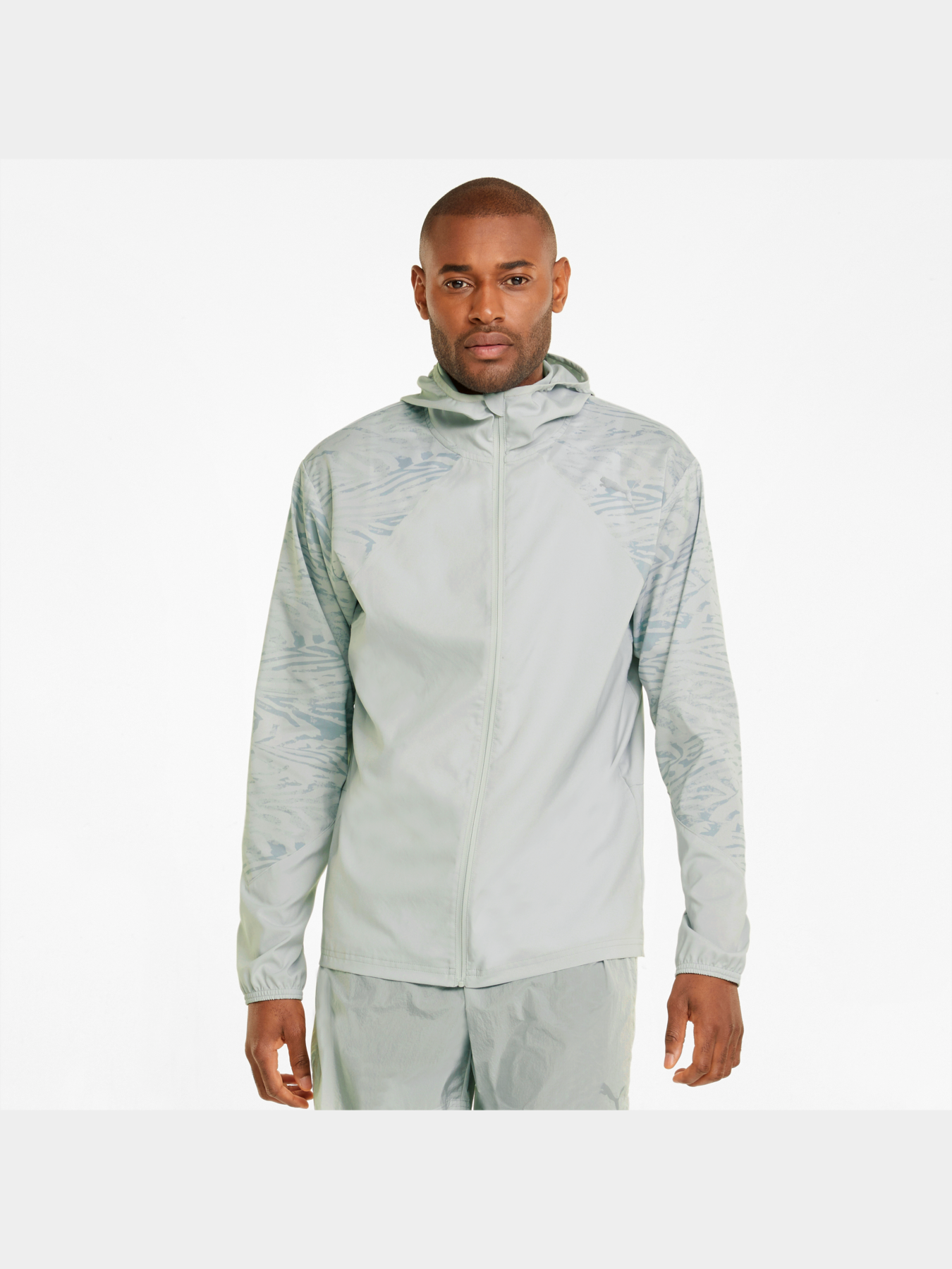 Куртки та дублянки PUMA Run Graphic Hooded Jacket M модель 521405 Фото