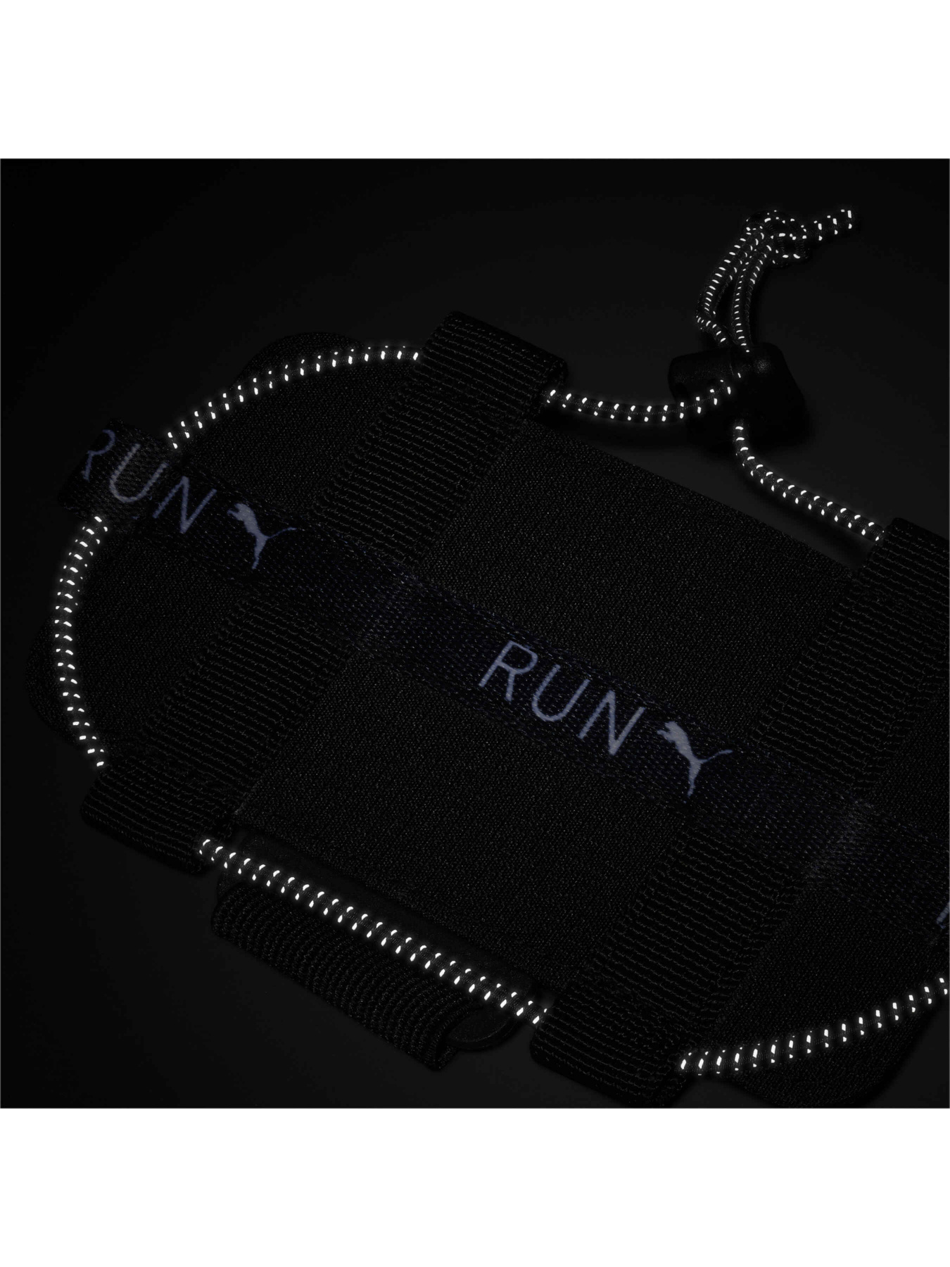 Аксесуари для смартфонів PUMA Pr Phone Holder модель 078500 Аксесуари для смартфонів PUMA Pr Phone Holder модель 078500 Фото