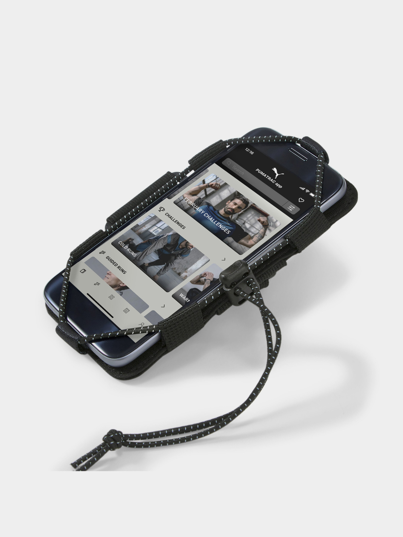 Аксесуари для смартфонів PUMA Pr Phone Holder модель 078500 Аксесуари для смартфонів PUMA Pr Phone Holder модель 078500 Фото