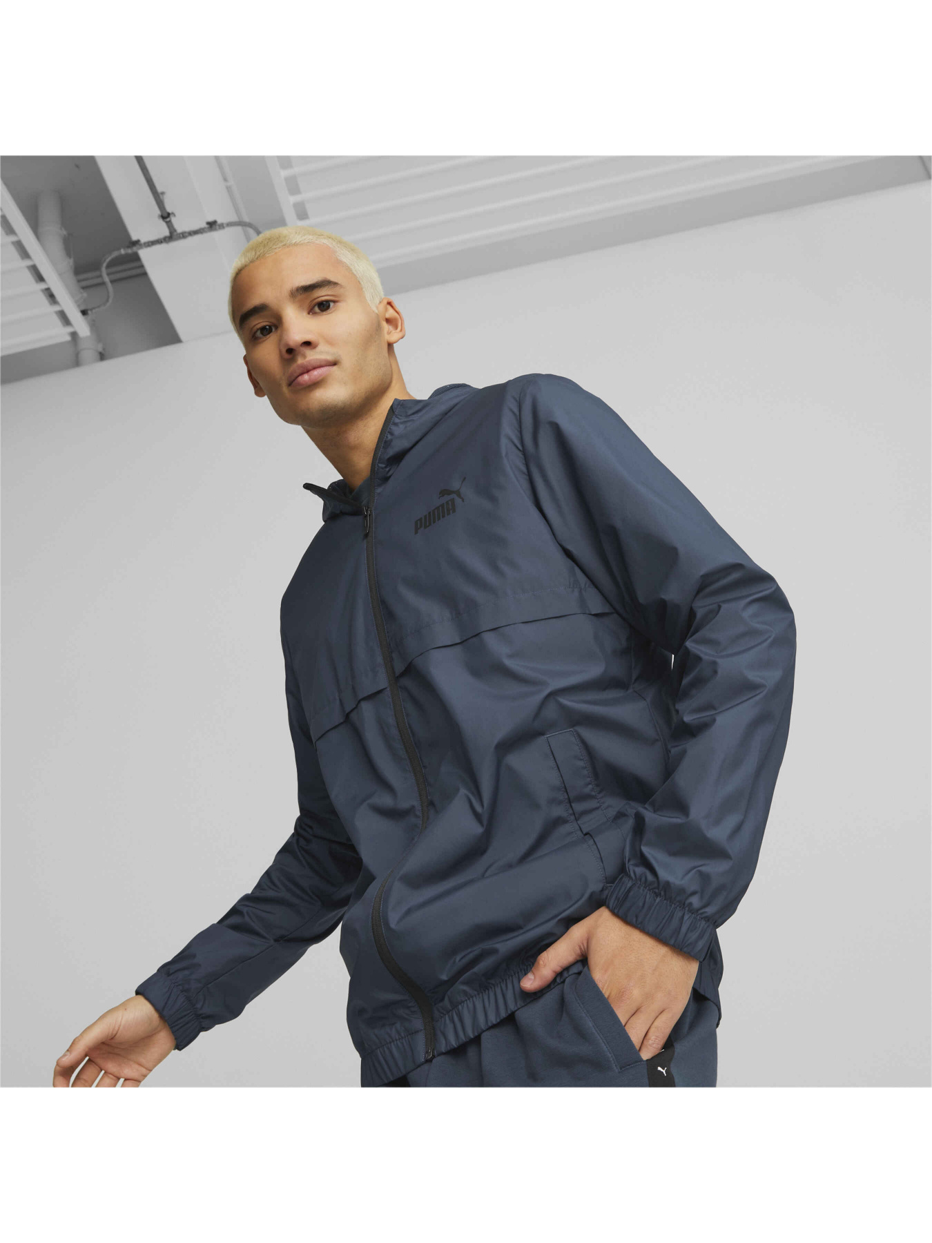 Куртки та дублянки PUMA Ess Solid Windbreaker модель 847484 Фото
