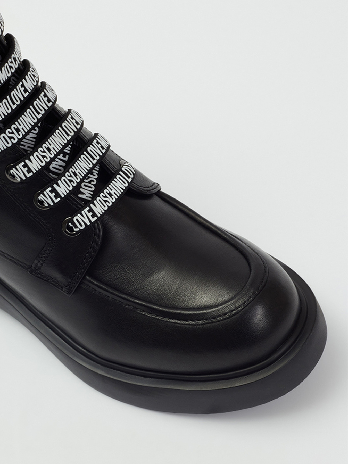 Ботинки и сапоги Moschino модель JA24214G0LIA0000 Фото