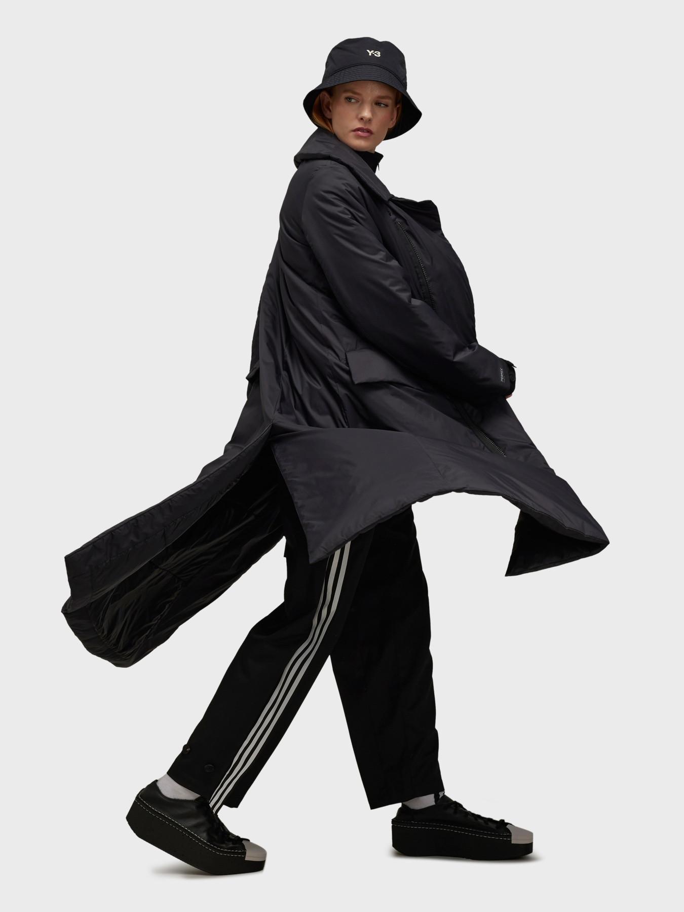 Пальто и плащи Adidas модель IW7487 Пальто и плащи Adidas модель IW7487 Фото
