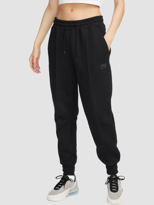 Брюки NIKE W Nsw Tch Flc Mr Jggr модель FB8330-010 Фото