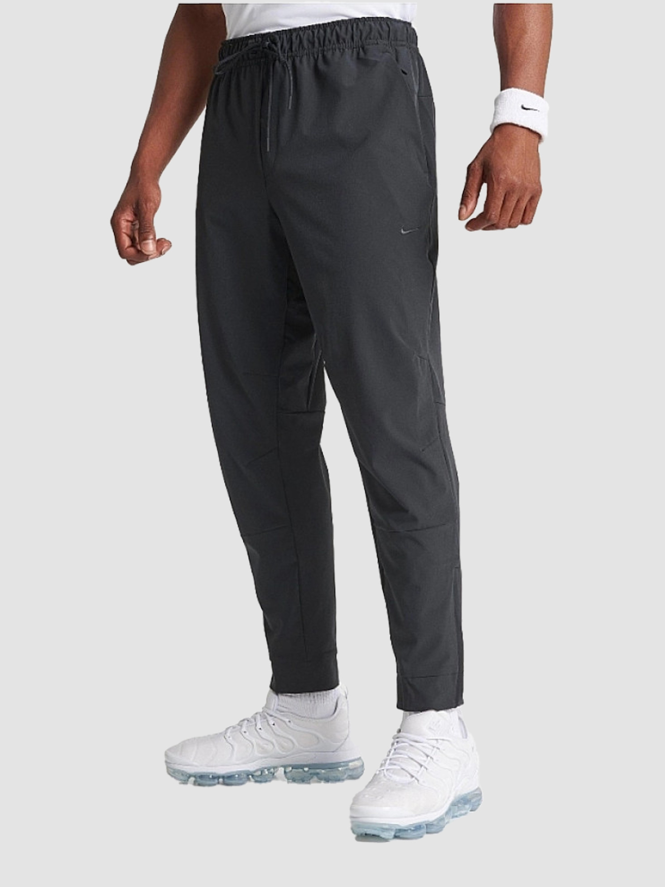 Штани NIKE Dri-Fit Unlimited Tapered Leg модель FB7548-010 Фото