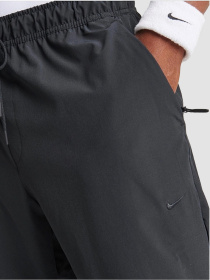 Штани NIKE Dri-Fit Unlimited Tapered Leg модель FB7548-010 Фото