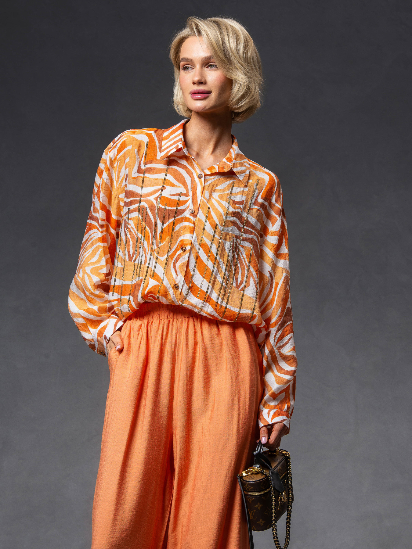Костюми VIVA WEAR модель 0505-ital-orange Костюми VIVA WEAR модель 0505-ital-orange Фото