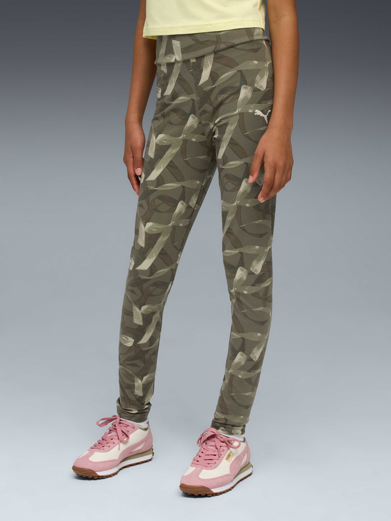 Брюки PUMA Bowtique Aop Leggings модель 632221 Брюки PUMA Bowtique Aop Leggings модель 632221 Фото