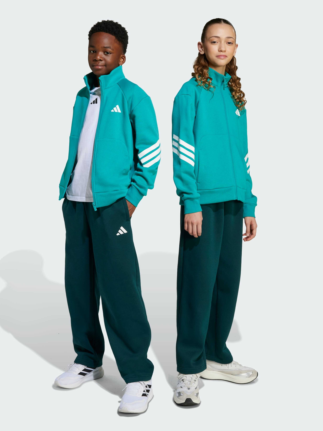 Костюми Adidas 3 Stripes модель JM1268 Костюми Adidas 3 Stripes модель JM1268 Фото