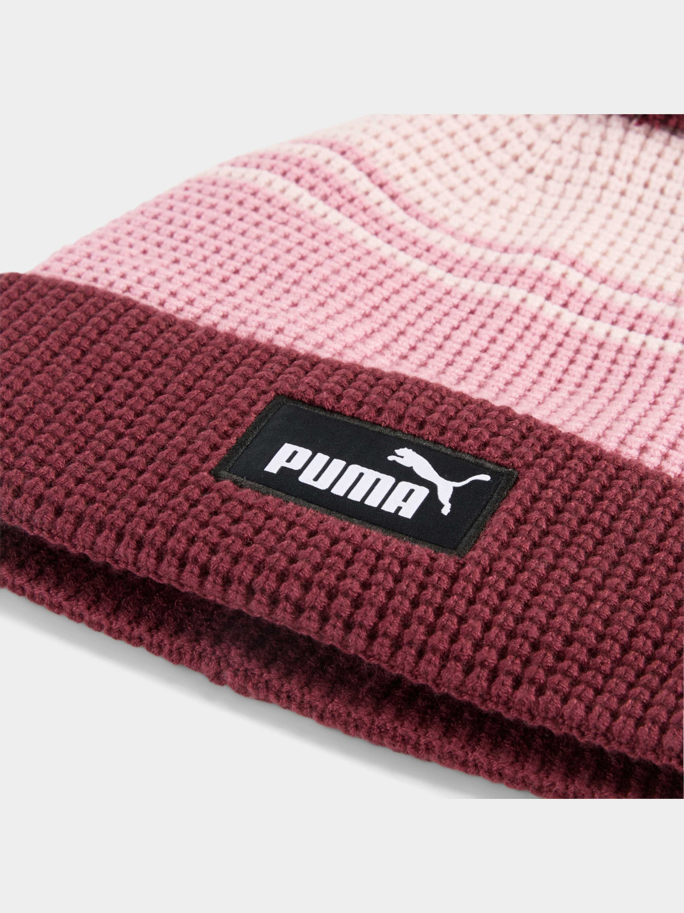 Шапки та кепки PUMA Ess Mid Crown Pom Beanie модель 026550 Фото