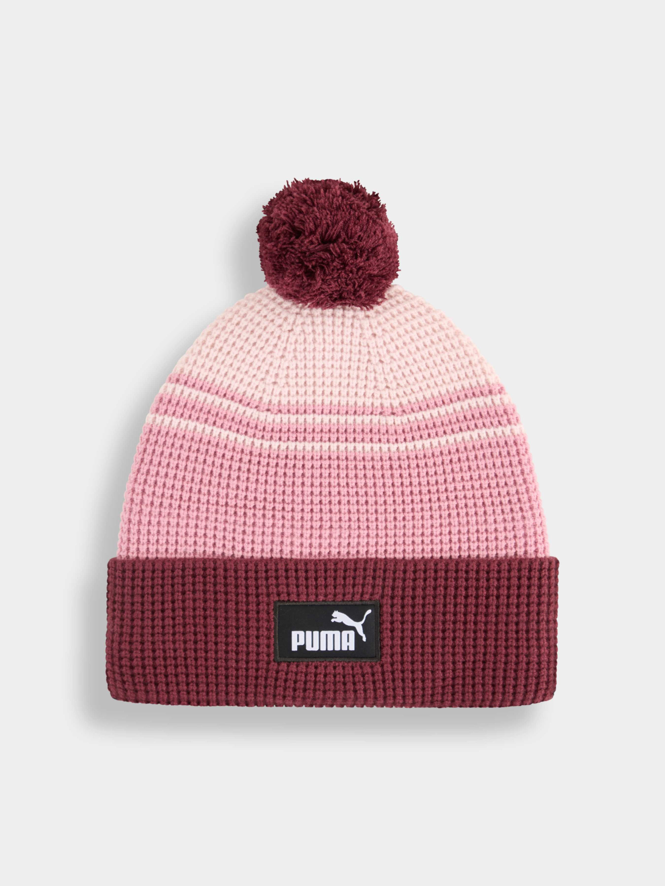 Шапки та кепки PUMA Ess Mid Crown Pom Beanie модель 026550 Фото