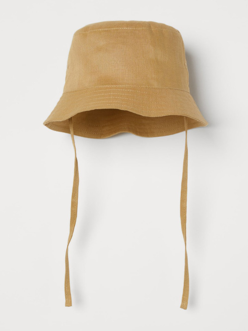Шапки та кепки H&M модель 6944581kwer_Горчичный Фото