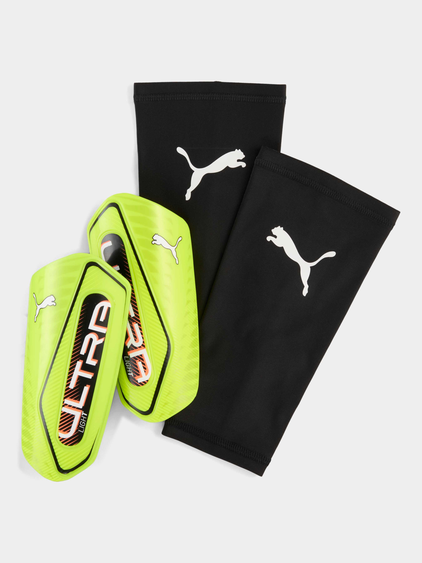 Щитки PUMA Ultra Light Sleeve модель 030989 Щитки PUMA Ultra Light Sleeve модель 030989 Фото