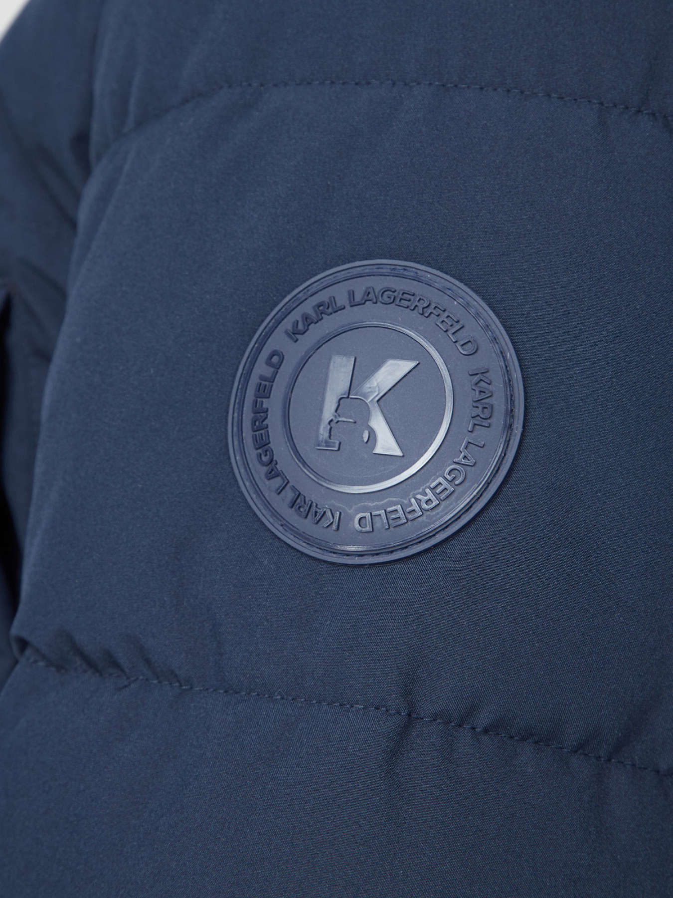 Куртки и дубленки Karl Lagerfeld модель 534586.505035;690 Фото