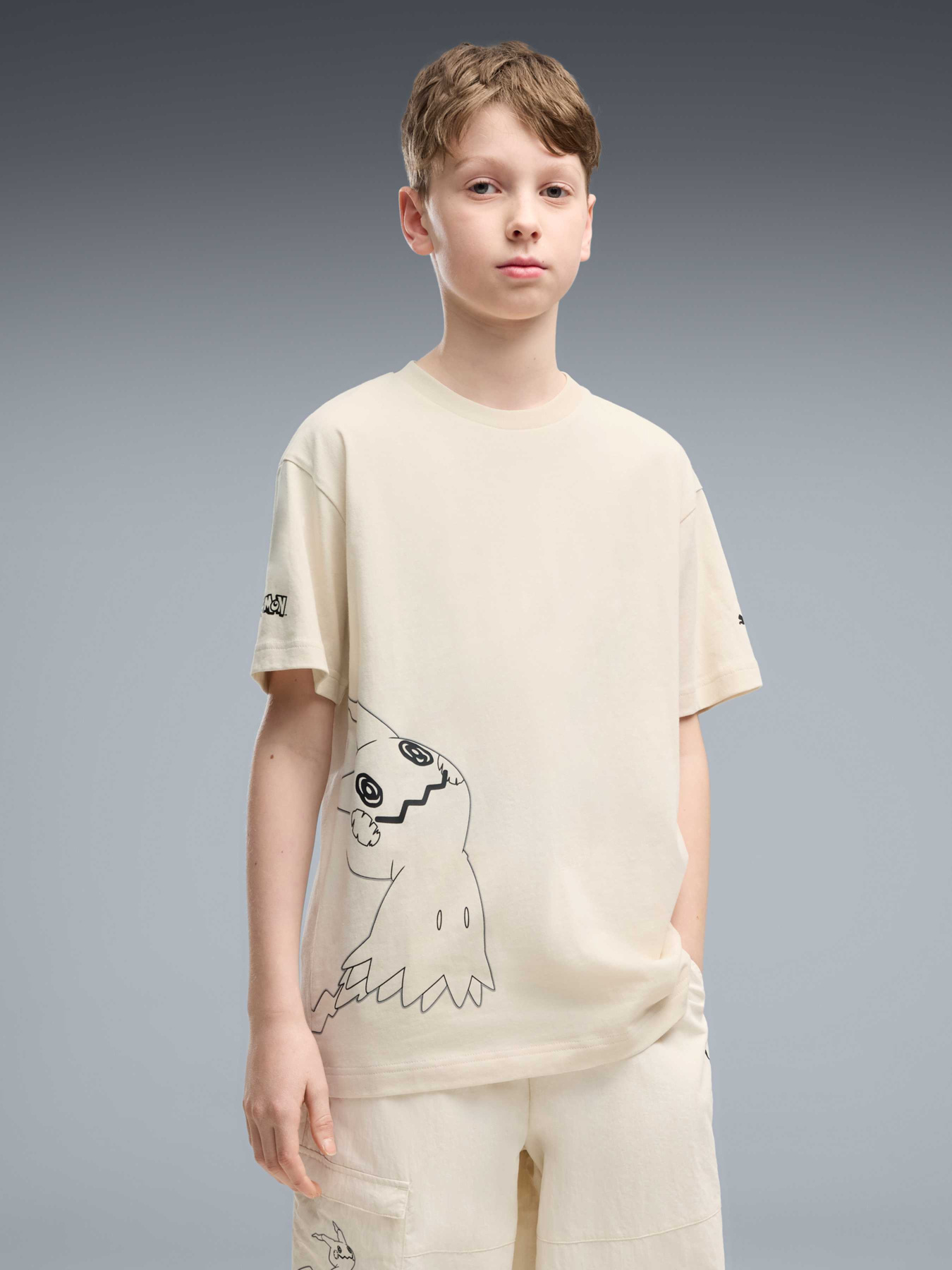 Футболки і поло PUMA x Pokemon Graphic Tee модель 634944 Фото